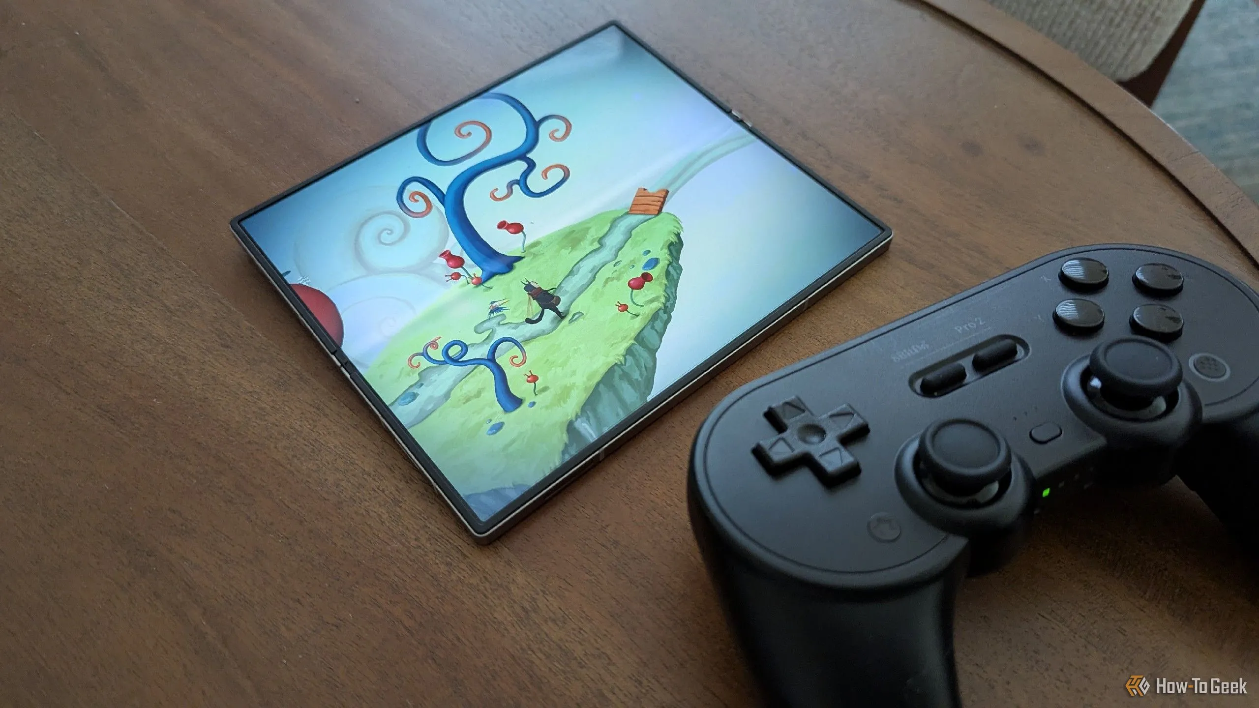 Game Figment trên Galaxy Z Fold 6 cùng tay cầm 8bitdo Pro 2, minh họa khả năng hồi sinh game cũ.