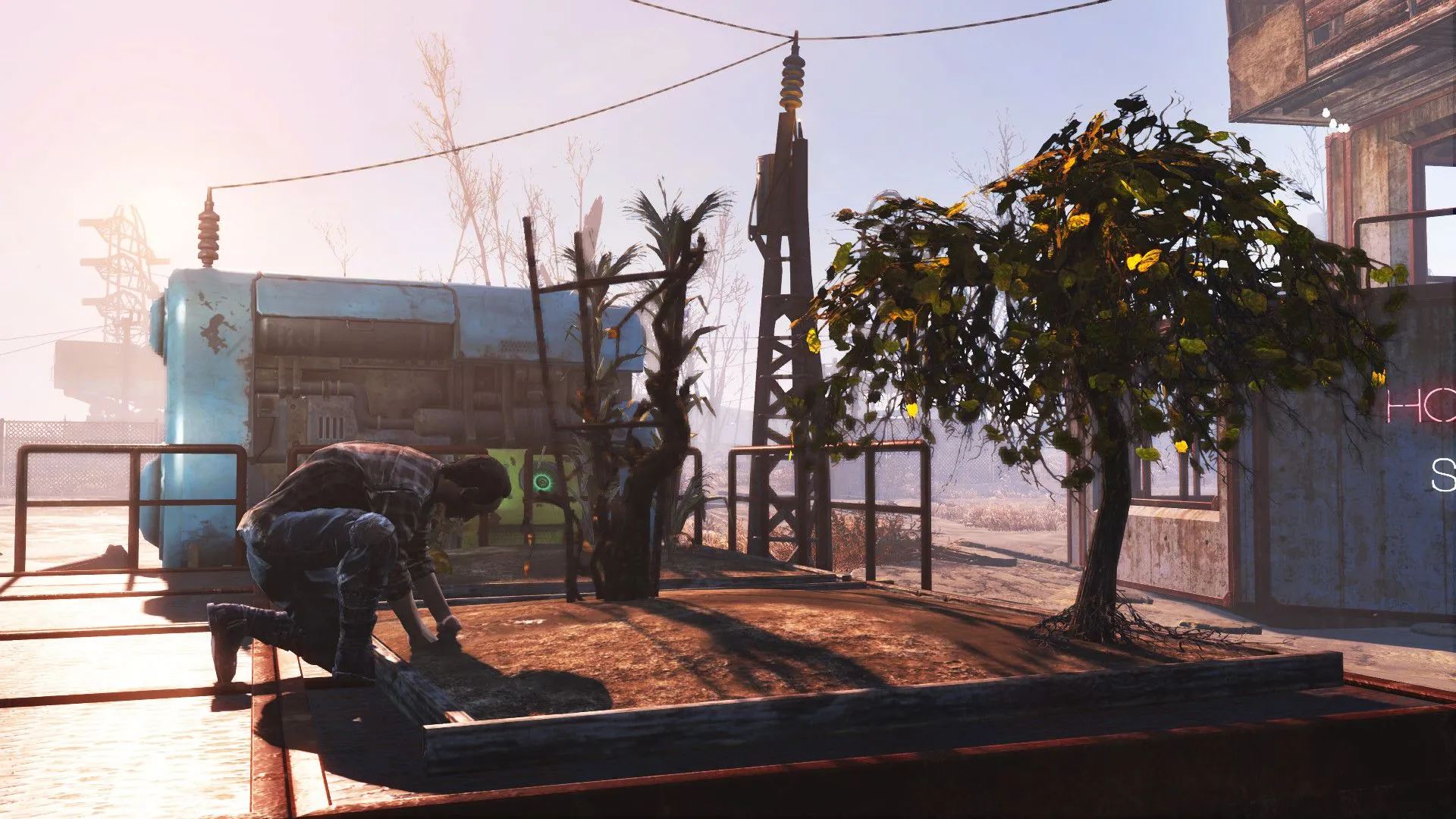 Người chơi đang chăm sóc nông trại tại một khu định cư trong Fallout 4, minh họa cơ chế xây dựng và quản lý.