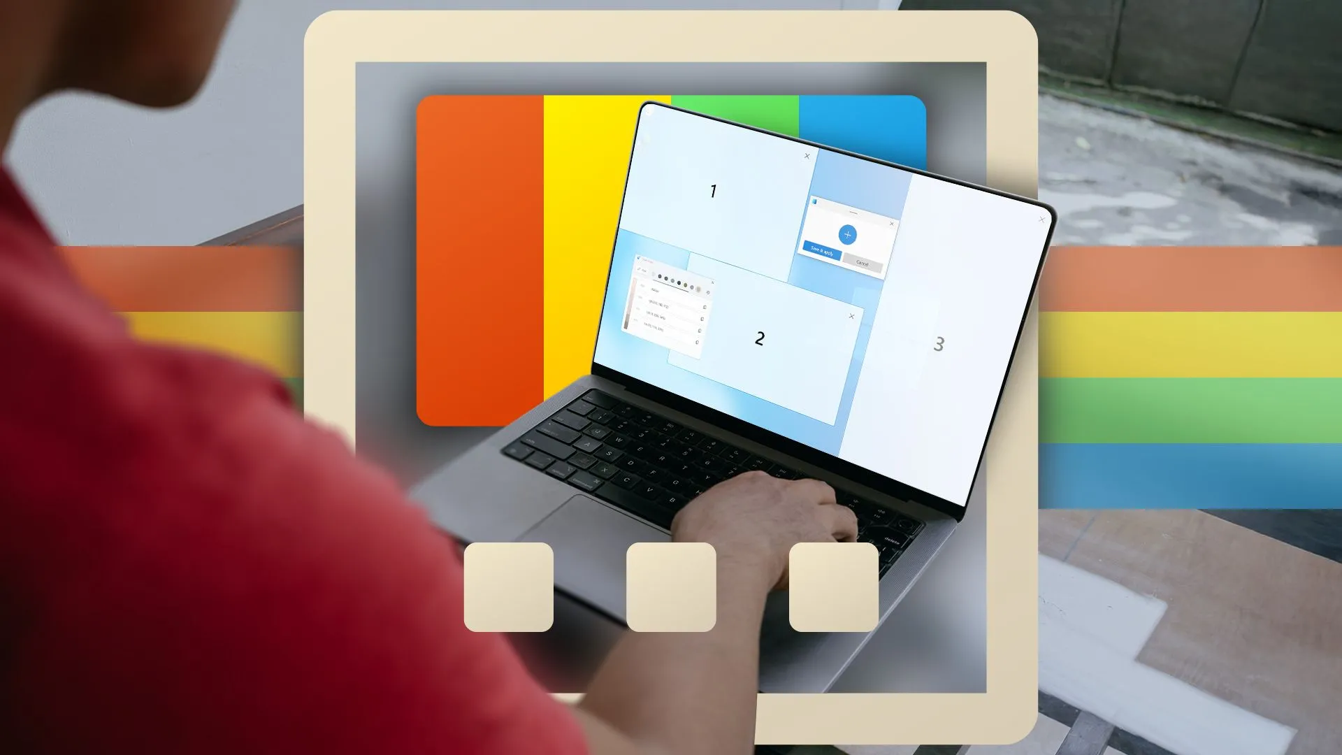 Người đàn ông sử dụng laptop với tính năng FancyZones của PowerToys được bật, thể hiện khả năng chia màn hình linh hoạt.
