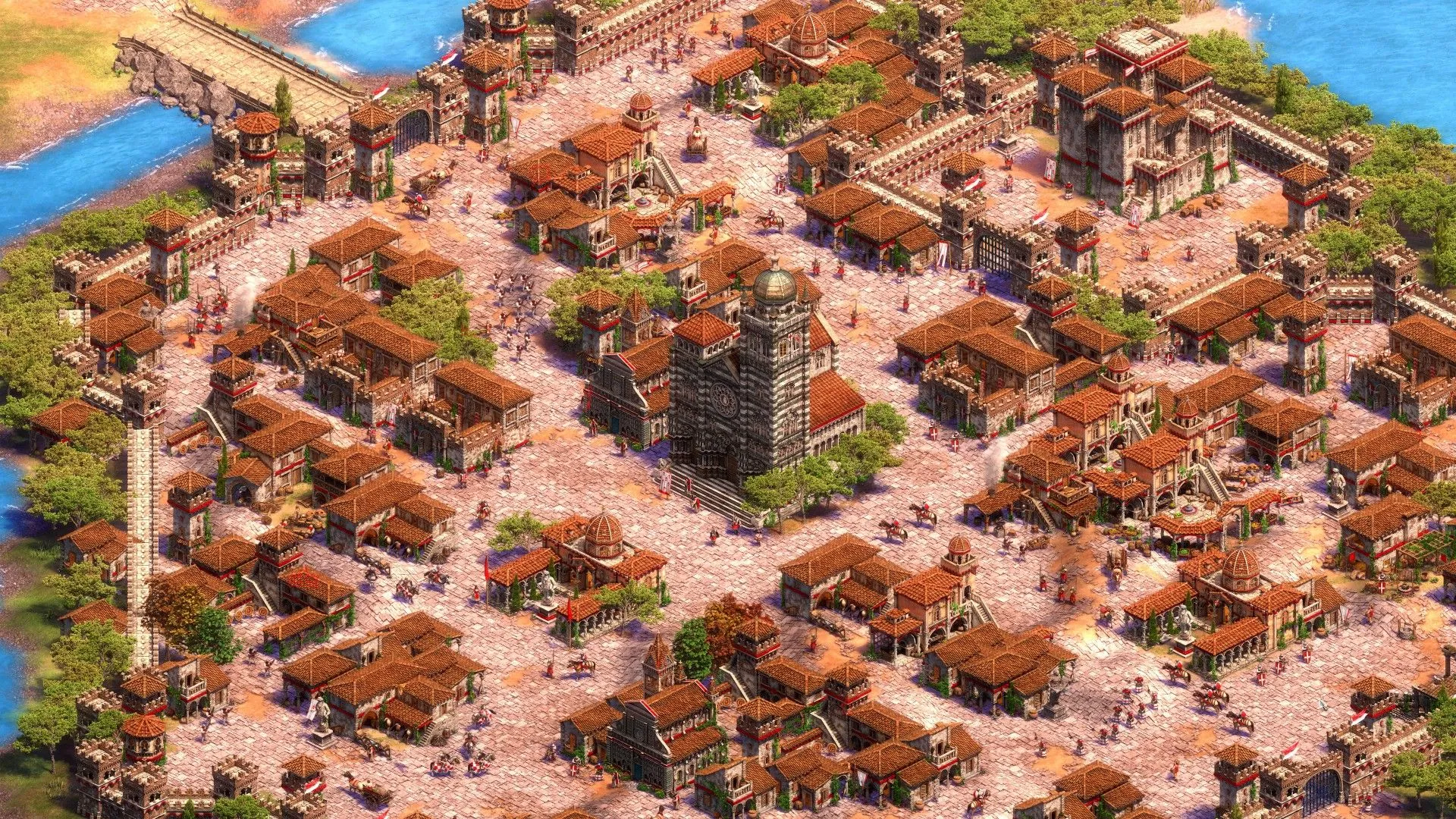 Thành phố trung cổ sầm uất với người dân trong game Age of Empires II