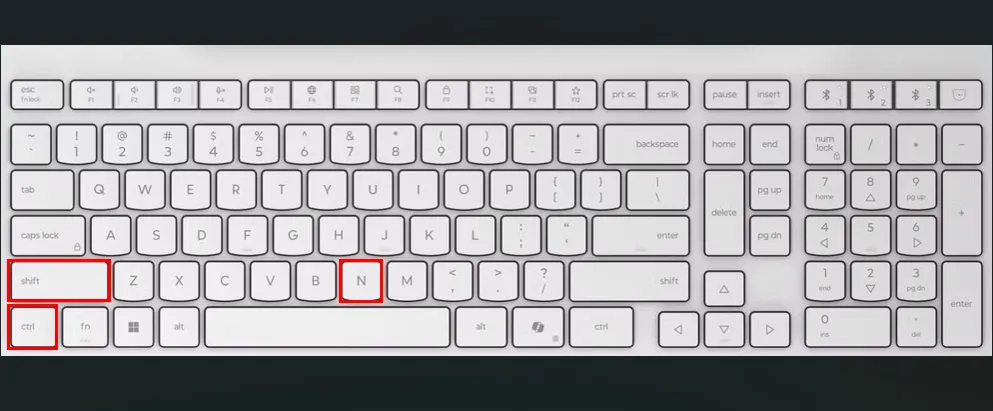 Bàn phím màu trắng với các ô đỏ làm nổi bật các phím Ctrl, Shift và N.