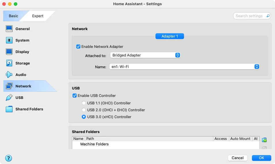 Cài đặt mạng &quot;Bridged Adapter&quot; và chọn giao diện mạng phù hợp (ví dụ: en1 cho Wi-Fi) cho máy ảo Home Assistant trong VirtualBox.
