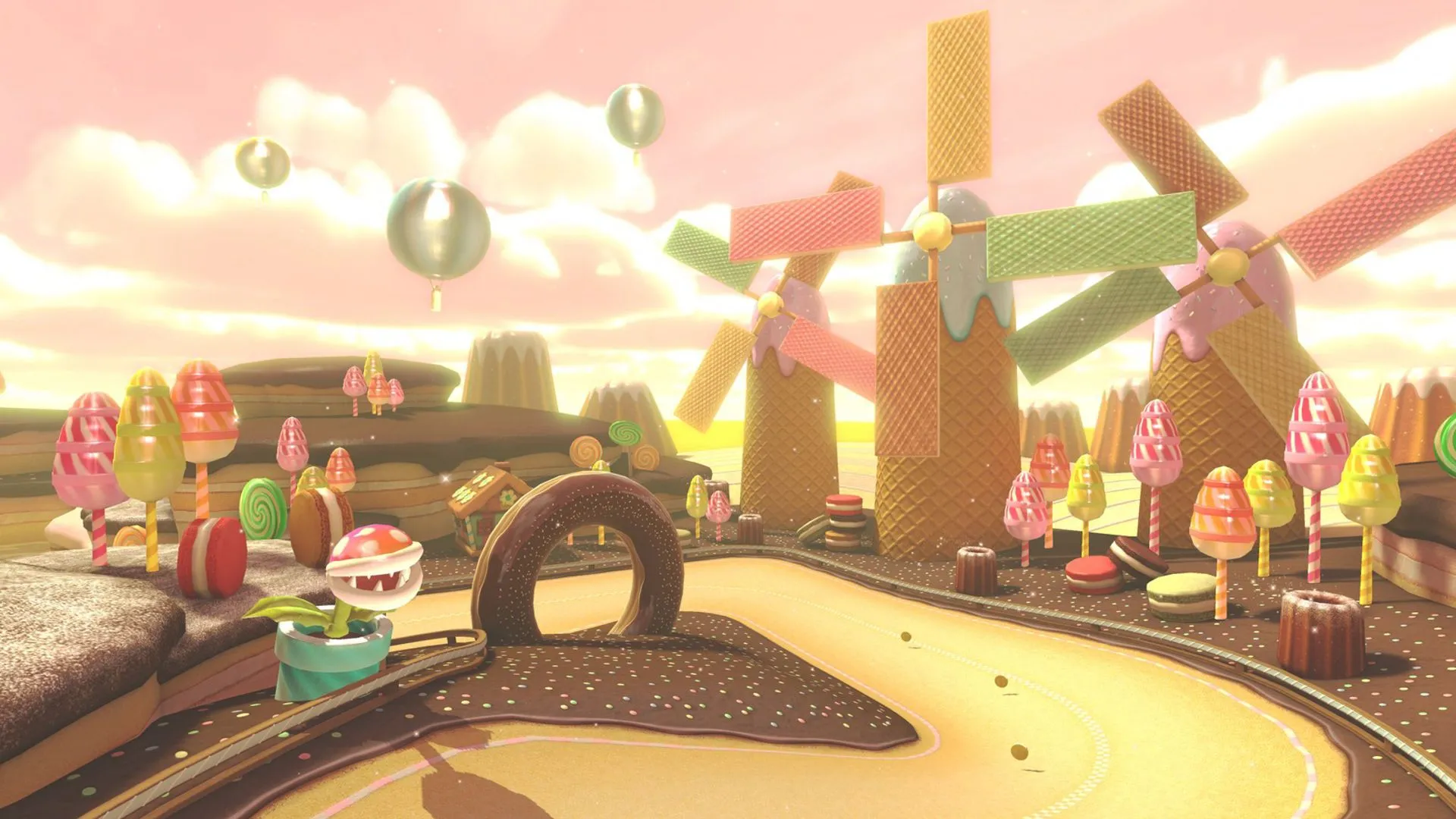 Cảnh giới thiệu đường đua Sweet Sweet Canyon rực rỡ với các yếu tố kẹo ngọt trong Mario Kart 8 Deluxe