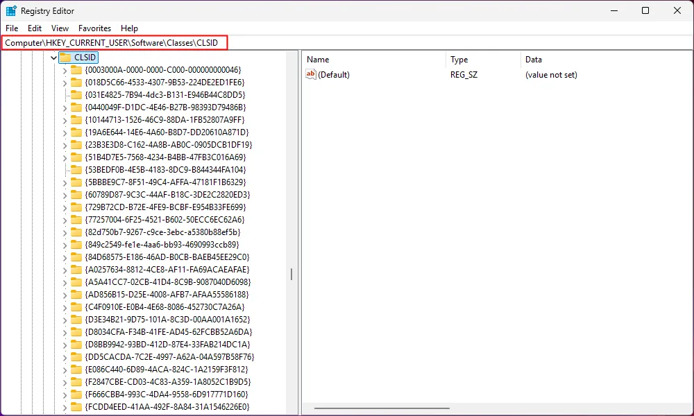 Cửa sổ Registry Editor đang mở khóa CLSID, chuẩn bị cho việc tùy chỉnh menu ngữ cảnh.