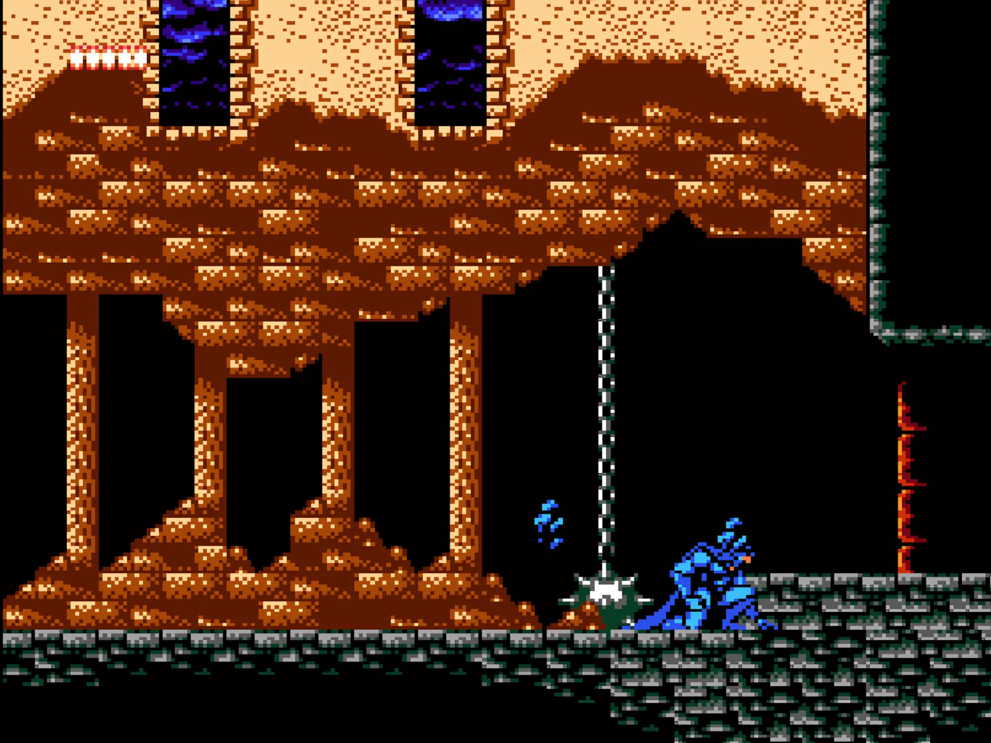 Màn hình gameplay của Batman: Return of the Joker trên Game Boy, Batman đang di chuyển qua một khu vực đô thị