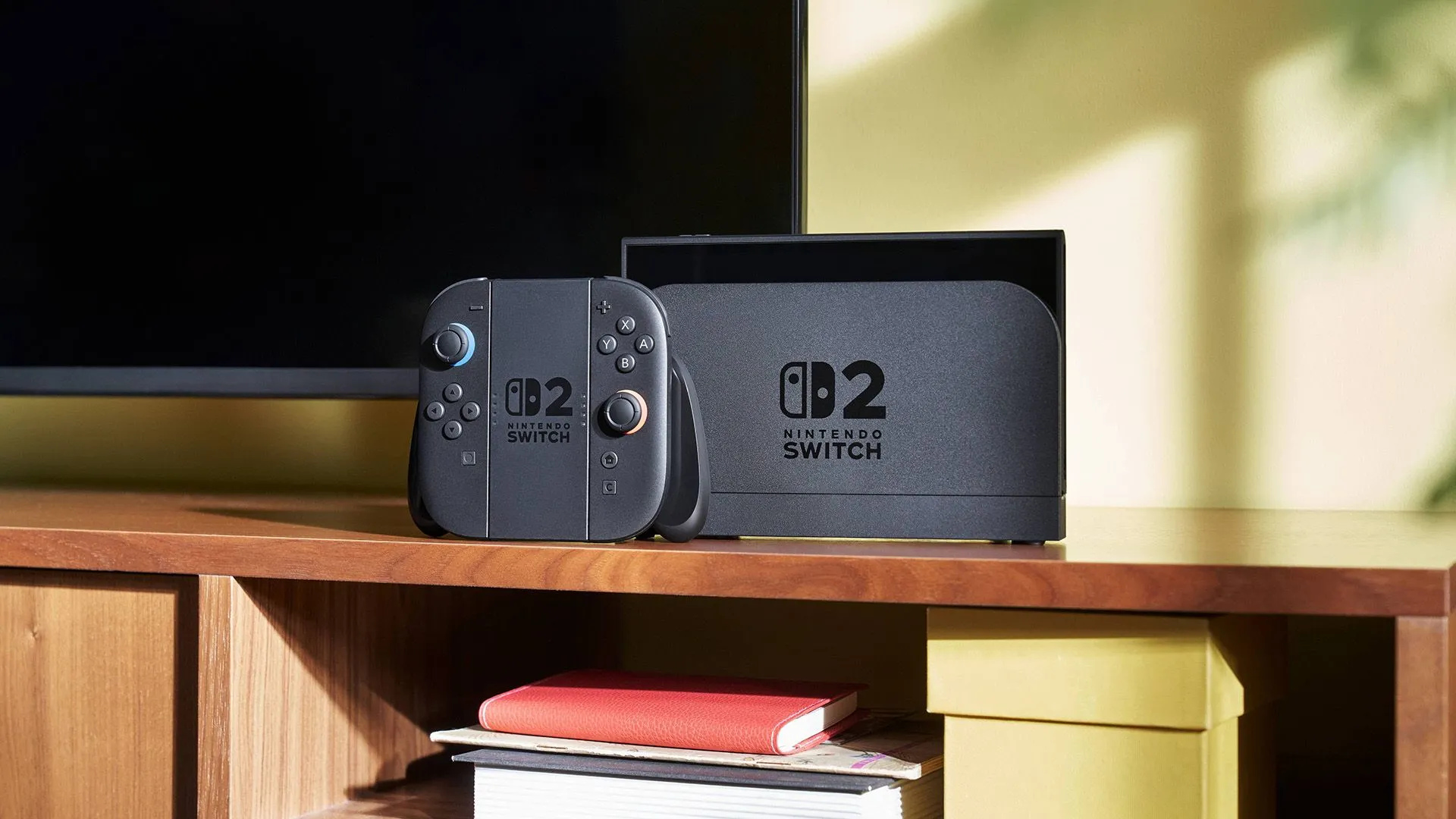 Máy chơi game Nintendo Switch 2 kèm Joy-Con đang kết nối với TV, minh họa trải nghiệm chơi game tại nhà.